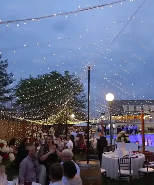 Overhead strings of lights wedding