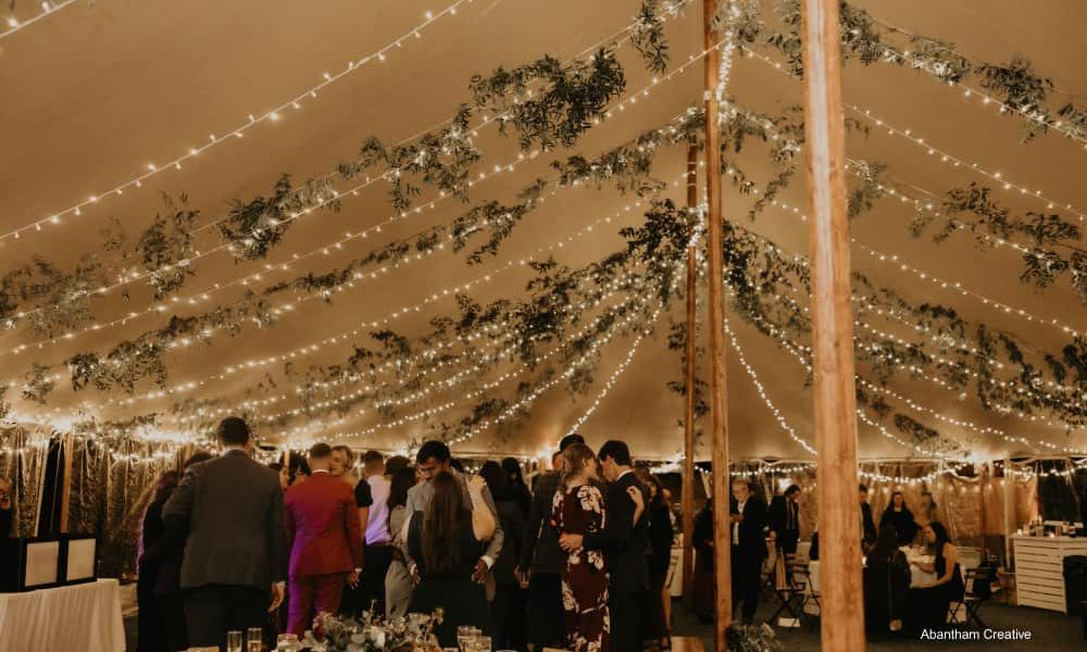 Overhead tent lighting wedding